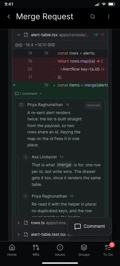 Merge request with a code diff and a review thread