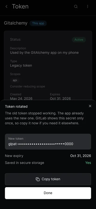 The rotate result sheet showing a masked new token, its new expiry date, the line Saved in secure storage and a Copy token button